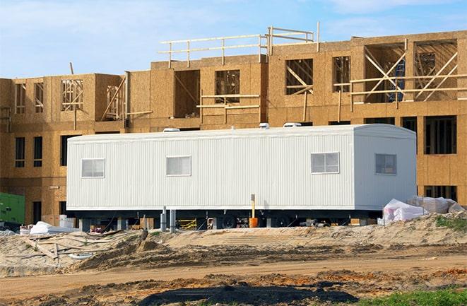 crane lifting modular building for construction office rentals in Barrington Hills, IL